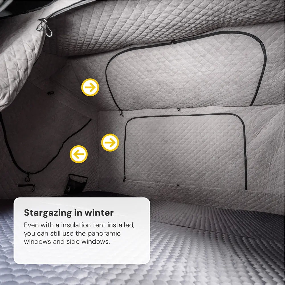Interior view of a gray tent with a quilted interior and black window frames; text "Stargazing in winter" at the bottom left.