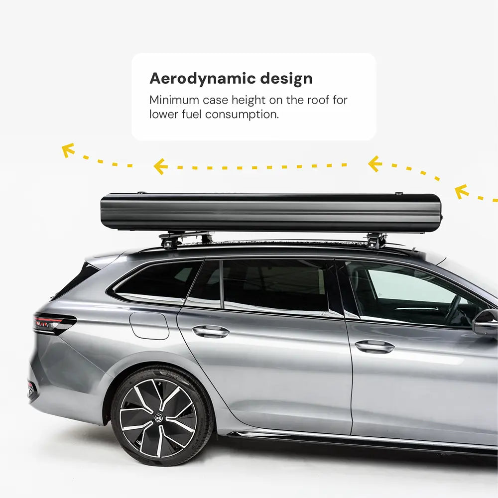 A silver estate car with a black roof box against a white background. Text box: "Aerodynamic design. Minimal roof box height for reduced fuel consumption."