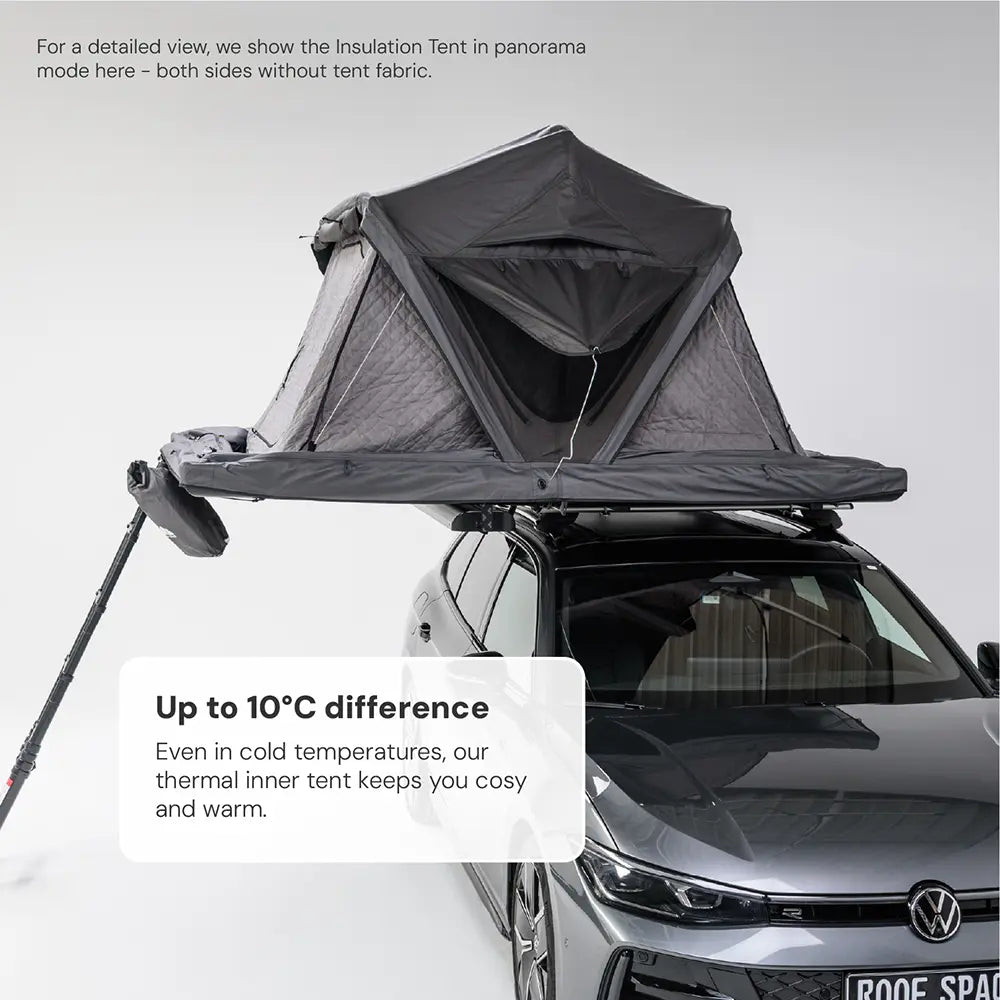 Grey car with a mounted, open rooftop tent, shown in panoramic view. Text: “Up to 10°C difference. Thermal inner tent keeps you nice and warm.” Bright studio setting.
