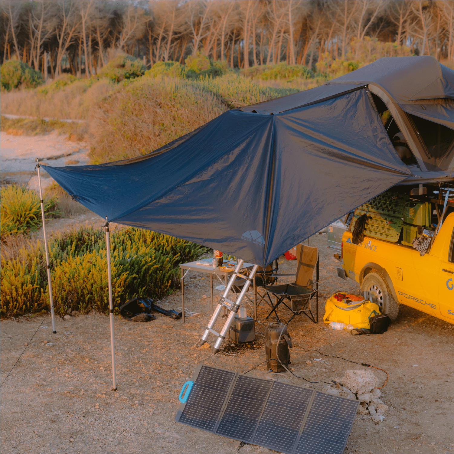 Light Awning in Outdoor Camping-setup with the Roof Space rooftent.